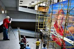 John Pint photographing the Hospital Mural