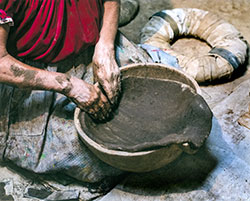 traditional, donut-shaped pot stand